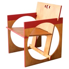a chair made out of wood with a red back and seat on it's side