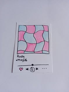 a piece of paper that has been drawn on to the side of a white surface