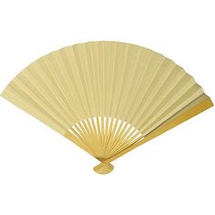 a fan that is sitting on top of a white surface with gold trimmings