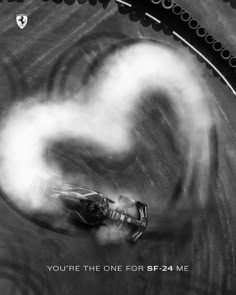 a black and white photo of a car on a track with the words you're the one for sp - 24 me