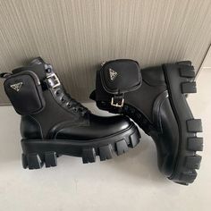 Prada Monolith leather and Re-Nylon boots with pouch