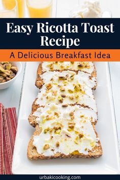 a white plate topped with slices of bread covered in cheese and toppings next to orange juice