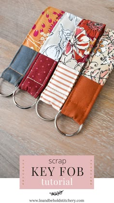 four key fobs with different patterns on them and the text scrap key fob