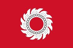 a red and white flag with a circular design on it