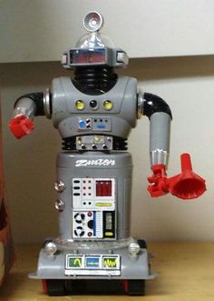 a toy robot that is sitting on a table