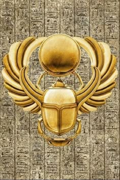 an egyptian scarp with wings on it