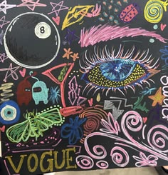 a chalkboard with an eye and some writing on it that says voggie