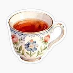 a watercolor painting of a cup of tea with flowers on the side sticker