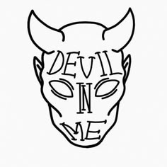 devil in me mask with horns and the word devil in me written on it's face