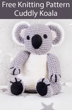 a crocheted koala bear sitting on top of a white blanket with the text free knitting pattern cuddly koala
