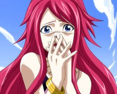 a woman with pink hair and blue eyes is holding her hands up to her face