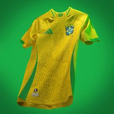 a yellow soccer jersey hanging on a green background