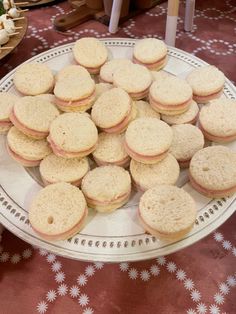 there are many small sandwiches on the plate