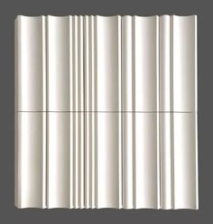 a white wall with vertical lines on it