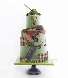 Army Themed Birthday Cake Inspiration, Three-tier Military-themed Cake, Army Themed Birthday Cake, Army Birthday Cake For Boys, Kids Military Party Cake Inspiration, Green Military Theme Cake, Green Army-themed Cake, Green Soldier-themed Cake, Green Military Style Cake