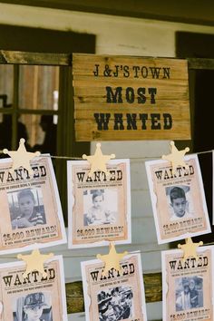 several wanted posters are hanging on a clothes line with wooden signs in the background that read, i & t's town most wanted