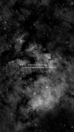 black and white photo of the sky with stars