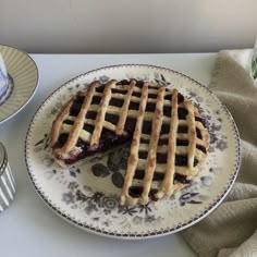 a plate with a piece of pie on it