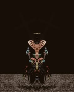 an animal print artwork with multiple colors and shapes in the middle, on a black background