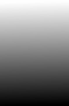 a black and white photo of an airplane in the sky