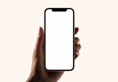 a hand holding an iphone with a white screen