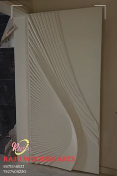 the wall is white and has wavy lines on it