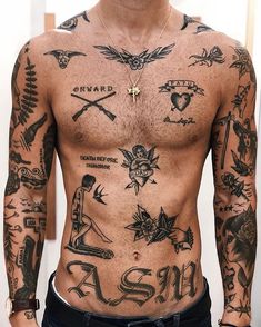 a man with many tattoos on his chest