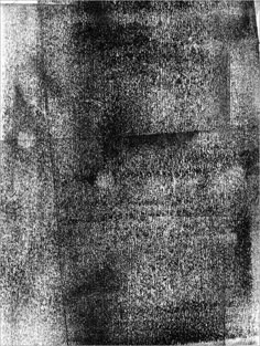 an old black and white photo with some type of textured paper on it's surface