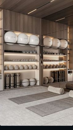 a room filled with lots of white plates and bowls on the shelves next to each other