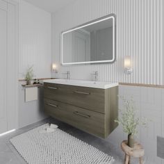 a bathroom with a large mirror, sink and toilet in it's center area