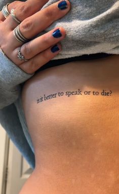 a woman's lower back with the words is it better to speak or die?