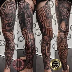 the legs are covered in black and grey tattoos with an image of a tiger on it