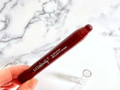 Ulta Beauty Gloss Stick in the shade Buggin, cap removed, handheld. Ulta Beauty, Clinique Black Honey Blush, Clinique Black Honey Packaging, Clinique Black Honey Lip Gloss, Black Honey Lipstick Clinique, Clique Black Honey Lipstick, Clinique Black Honey, Black Honey, Honey