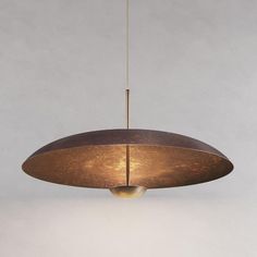 a light fixture hanging from a ceiling in a room