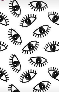 black and white drawing of an eye with large lashes on it's face, in front of a white background