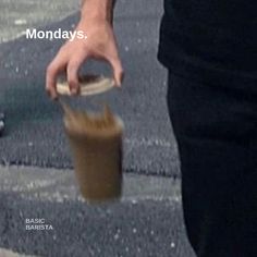 a person is holding a plastic cup with something in it and the words monday's