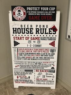 a sign that is on the side of a wall next to a door with instructions for beer pong and house rules
