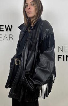 Edgy Leather Jacket With Fringe For Winter, Black Fringe Jacket Outfit, Chic Black Outerwear With Fringe, Fringe Jacket Outfit, Luxury Oversized Black Leather Jacket, Black Leather Outerwear With Fringe, Black Leather Fringe Jacket, Leather Fringe Coats & Jackets, Leather Jacket Style