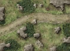 an aerial view of some rocks and trees in the middle of a grassy area with a yellow dot