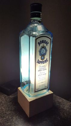 a bottle of alcohol sitting on top of a table