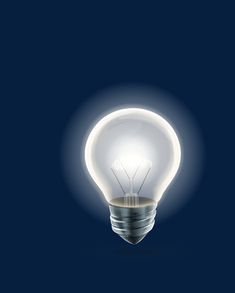 an illuminated light bulb on a dark blue background