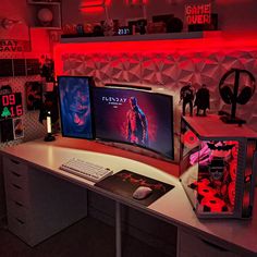 a desk with two computer monitors on it