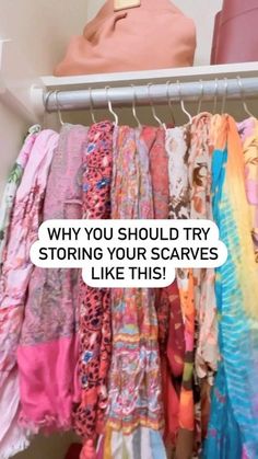 a rack with scarves on it and a bag in the background that says, why you should try to store scarves like this?