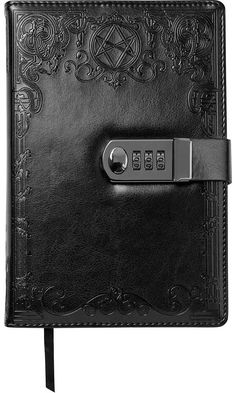 a black leather journal with a lock on it