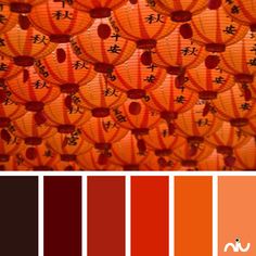 an orange and red color scheme with chinese characters on it's paper lanternes