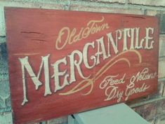 a sign on the side of a building that says old town mercantille