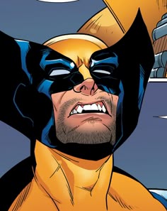 a close up of a person wearing a batman mask