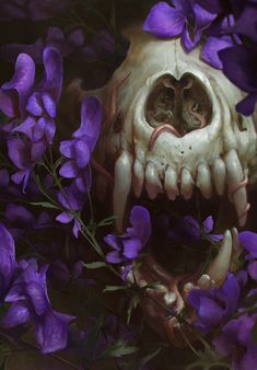 the skull is surrounded by purple flowers