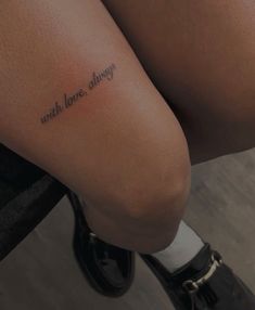 a woman's leg with the words, with love always written on it in cursive font