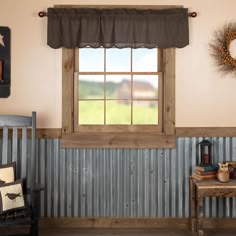 a room with an old fashioned window and wooden bench in front of the window,